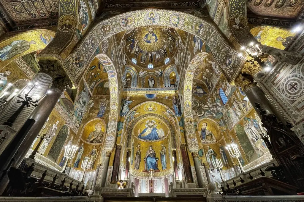 Interior of the Palatine Chapel in Palermo, glowing with Byzantine gold mosaics