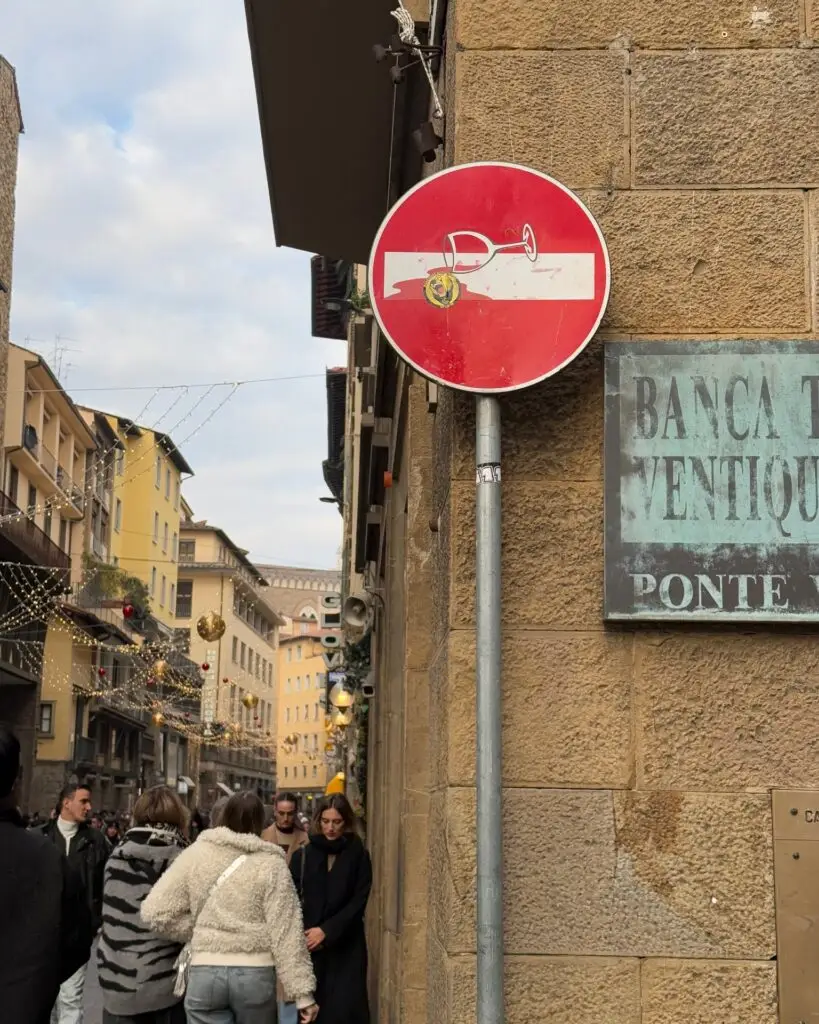 Clet Abraham altered street sign art in Florence